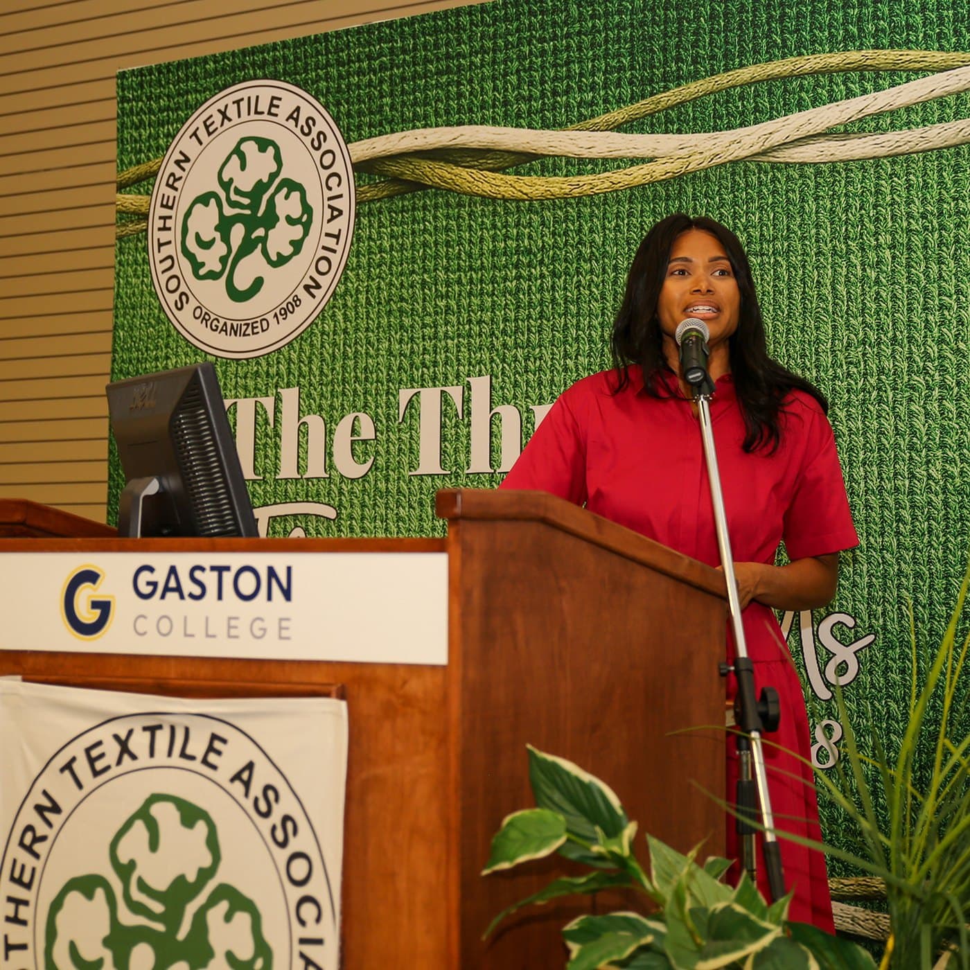Alexis Diaz speaking at the Southern Textile Association Summer Marketing Forum, Gaston College